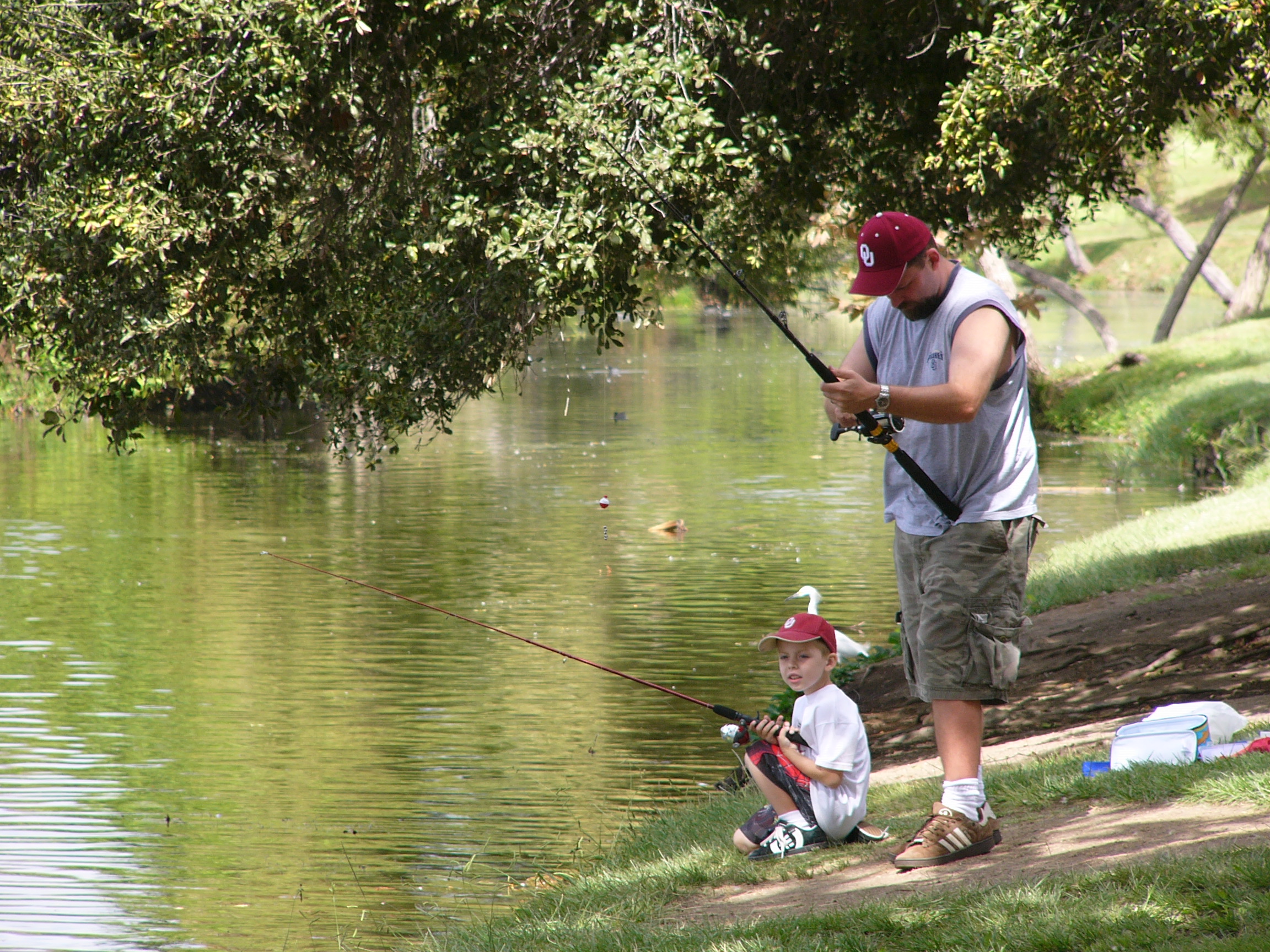 Dad-and-son-fishing-from-shore - Santee Lakes