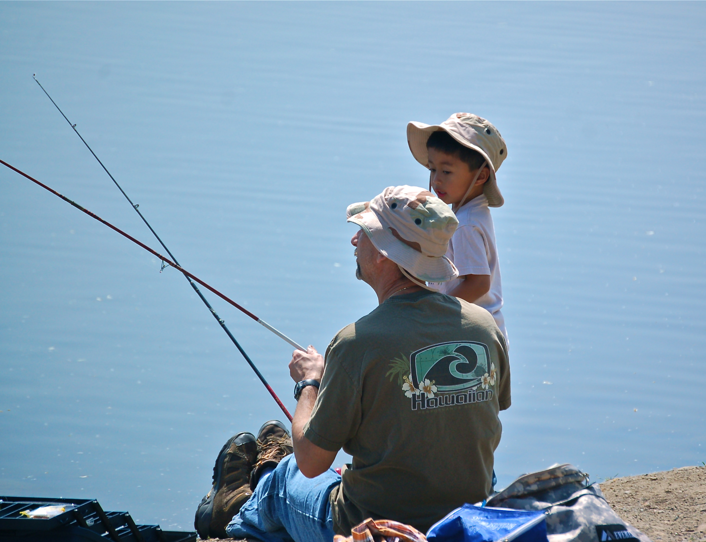 dad and boy fishing